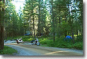 Motorcycle camping in the trees